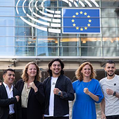 Group of people in front of a building